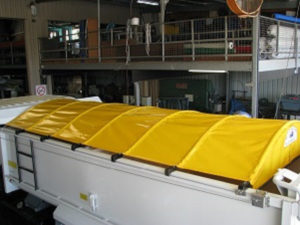 Wind out truck tarps.