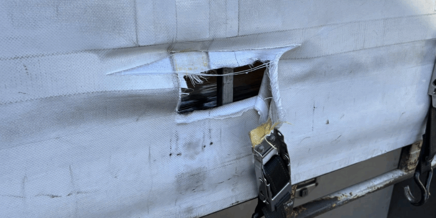 Ripped Truck Side Curtain